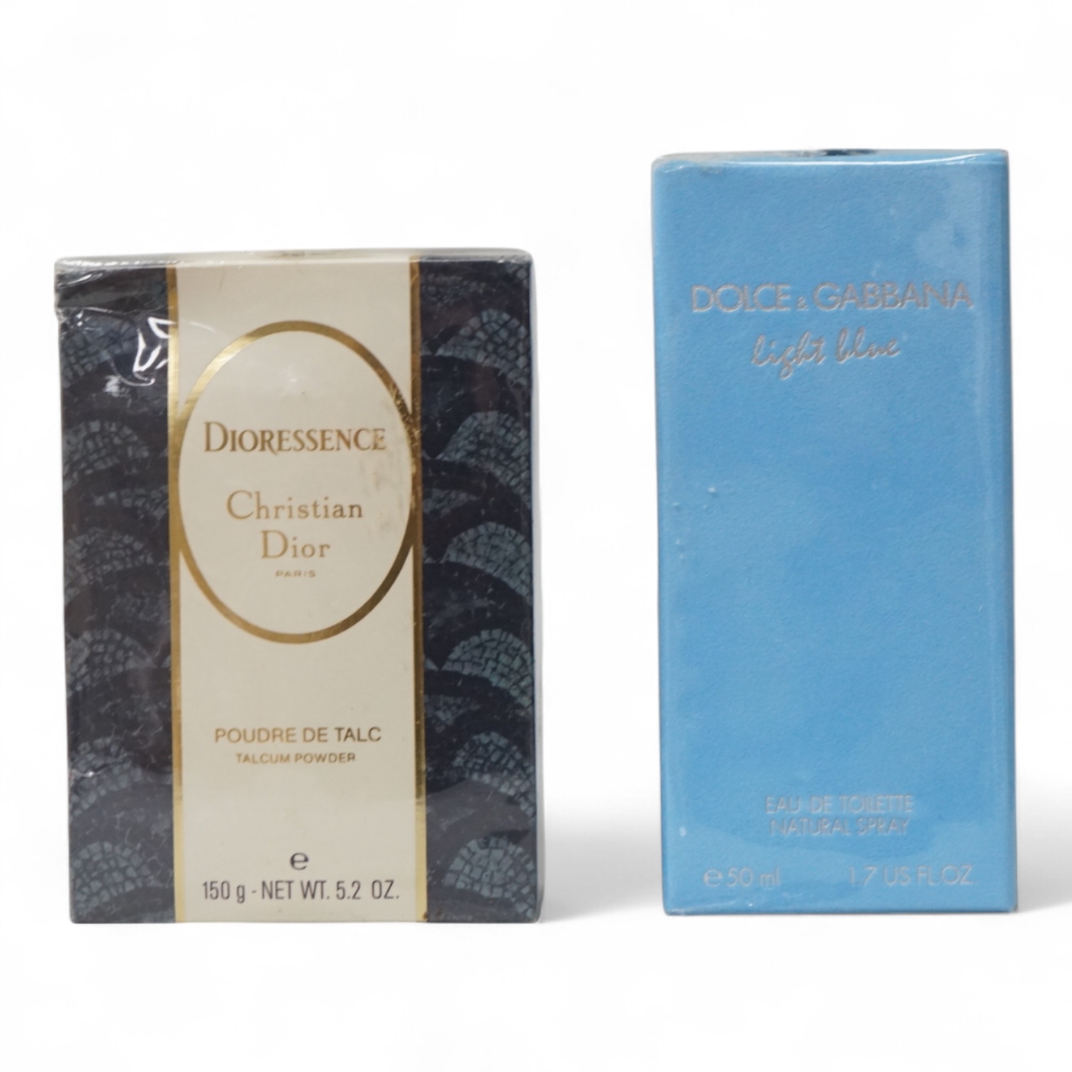 A bottle of vintage ladies Dolce & Gabbana perfume, Light Blue eau de toilette and a bottle Christian Dior, Dioressence talcum powder, each sealed and unopened